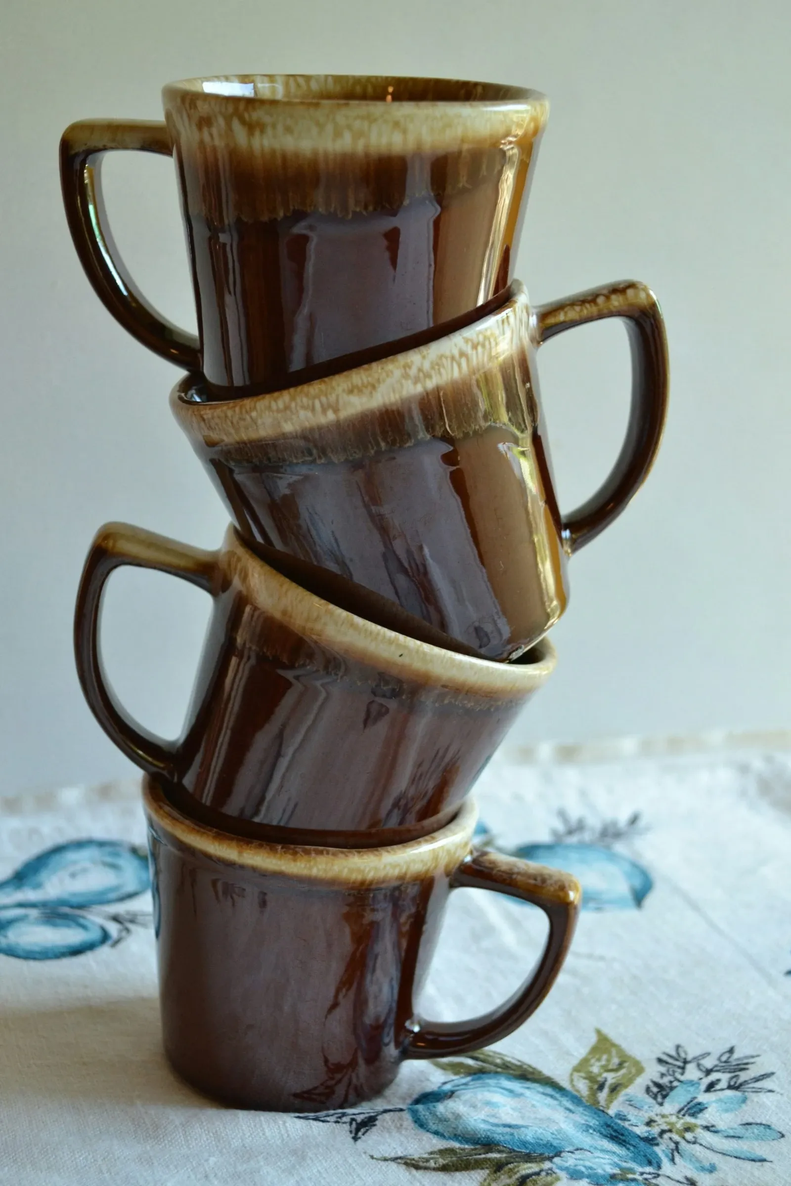 Stacked stoneware coffee mugs, a gift idea for coffee lovers